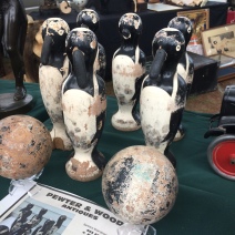 Penguin bowling pins with leather beaks at Brimfield